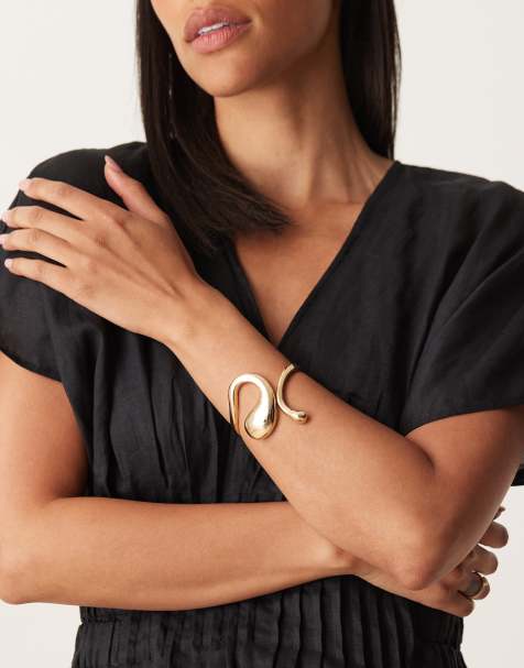 ASOS DESIGN – Guldfärgat, cuff-armband med smält design - view 1
