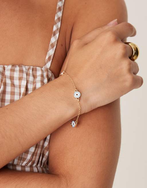 ASOS DESIGN – Guldfärgat enkelt kedjearmband med ljusblå ögon