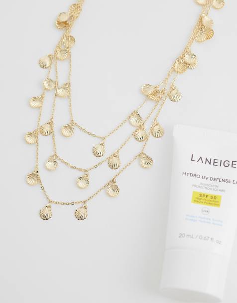 ASOS DESIGN – Guldfärgat halsband i flera rader med små snäckberlocker - view 1