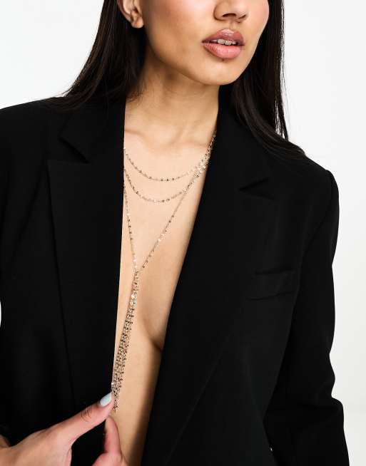 ASOS DESIGN – Guldfärgat halsband i flera rader med tofshänge