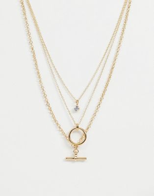 ASOS DESIGN – guldfärgat halsband med flera lager med minimala hängsmycken med öppen cirkel och stavar