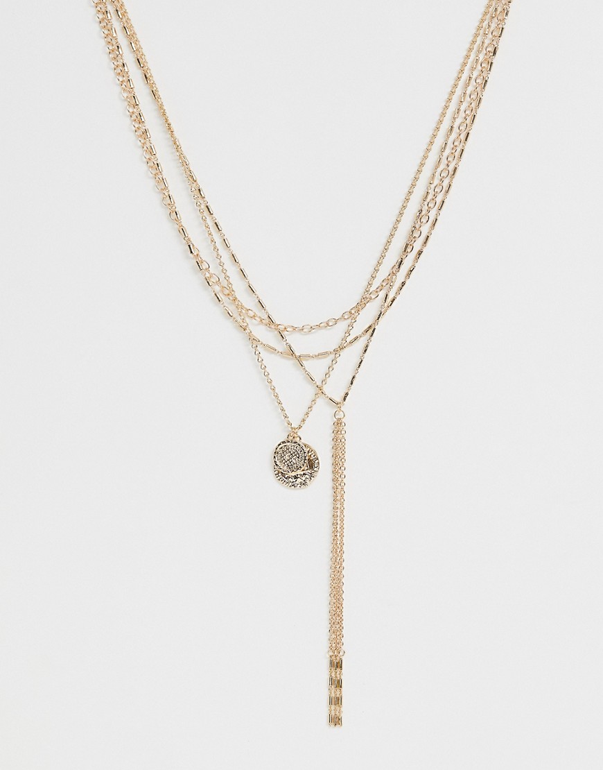 ASOS DESIGN – Guldfärgat halsband med flera rader och hängsmycken med stjärna och mynt