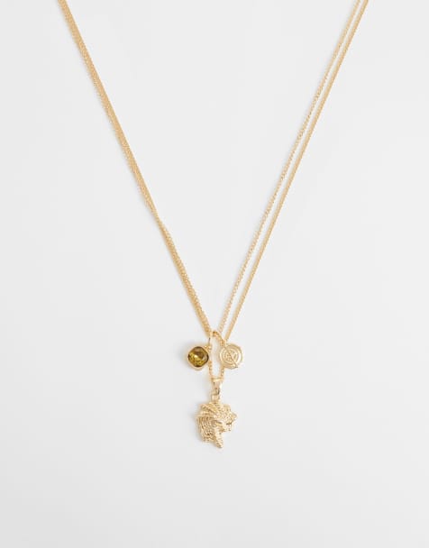 ASOS DESIGN – Guldfärgat halsband med grön sten och snäckskalshänge - view 1