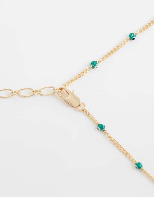 ASOS DESIGN – Guldfärgat, kort, smalt kedjehalsband med gröna ögondetaljer, 3 av 4