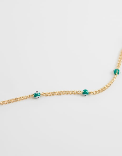 ASOS DESIGN – Guldfärgat, kort, smalt kedjehalsband med gröna ögondetaljer, 4 av 4