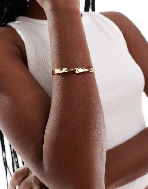 ASOS DESIGN – Guldfärgat manschettarmband med snurrad detalj - view 1