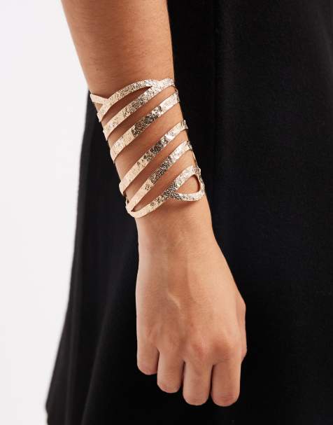 ASOS DESIGN – Guldfärgat, stort manschettarmband med hamrad, utskuren design - view 1