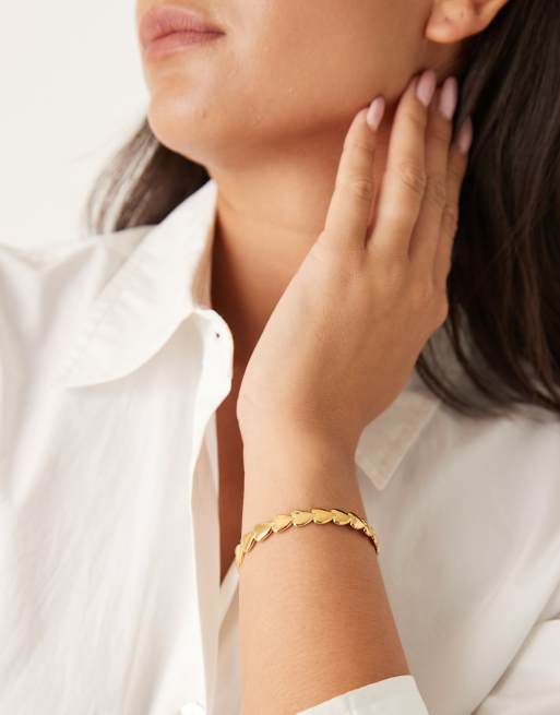 ASOS DESIGN – Guldfärgat, vattentåligt cuff-armband i rostfritt stål