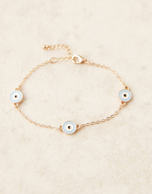 ASOS DESIGN - Guldfarvet armbånd med enkel kæde og lyseblå øjedetaljer, 2 af 3