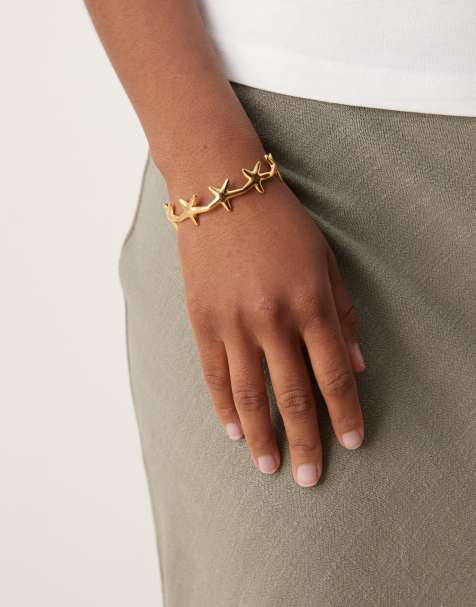 ASOS DESIGN - Guldfarvet armring med små søstjernedetaljer i vandfast, rustfrit stål - view 1