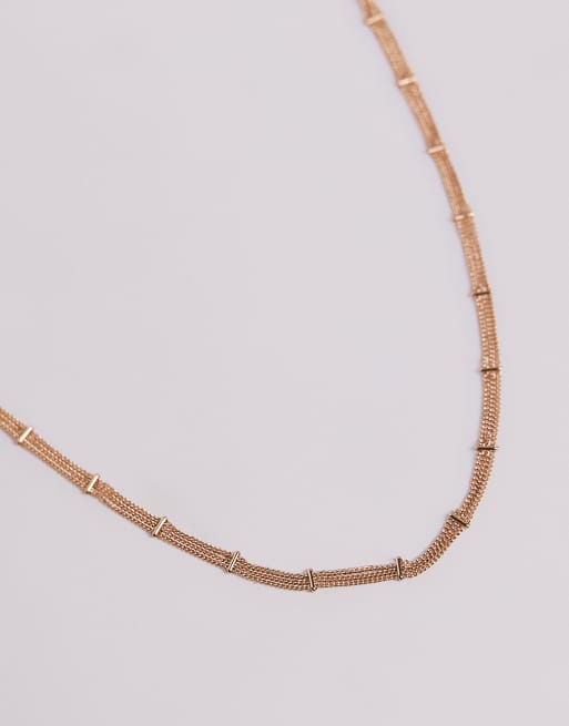 ASOS DESIGN - Guldfarvet choker-halskæde med spinkle kæder og jævnt fordelte kædeled, 2 af 3