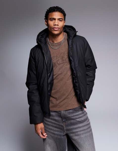 ASOS DESIGN – Gummierte Steppjacke in Schwarz - view 1