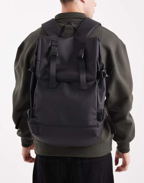 ASOS DESIGN – Gummierter Rucksack in Schwarz mit Rolltop-Verschluss - view 1