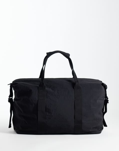 ASOS DESIGN gym holdall bag in black - view 1