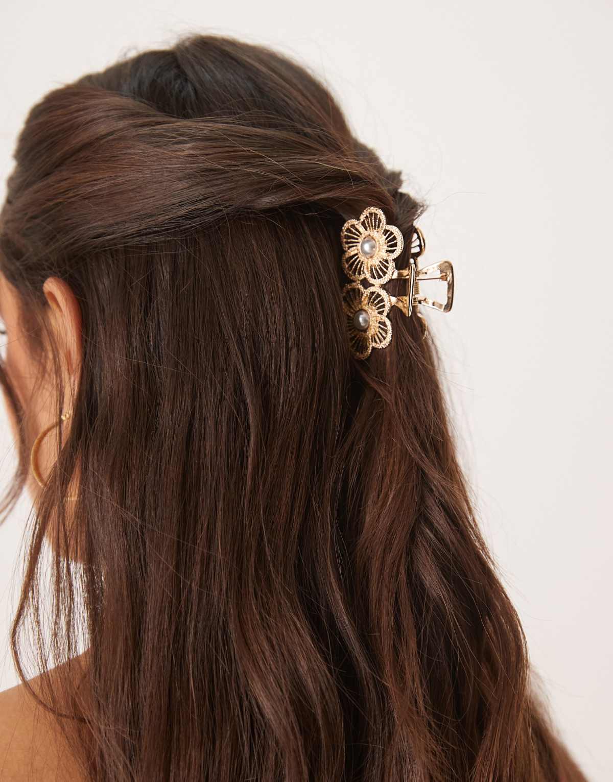 ASOS DESIGN hair claw with flower design and pearl detail in gold