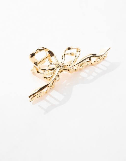 ASOS DESIGN hair claw with molten bow detail in gold tone, 2 of 4
