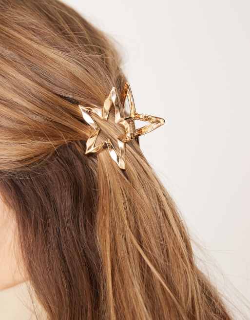 ASOS DESIGN hair claw with star design in gold