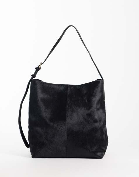 ASOS DESIGN hair on leather bucket bag in black - view 1