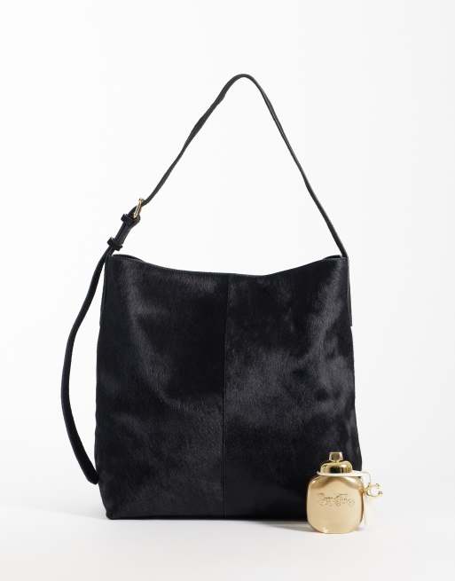 ASOS DESIGN hair on leather bucket bag in black, 2 of 4