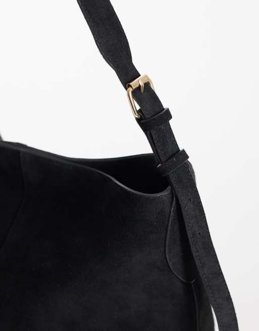 ASOS DESIGN hair on leather bucket bag in black, 3 of 4