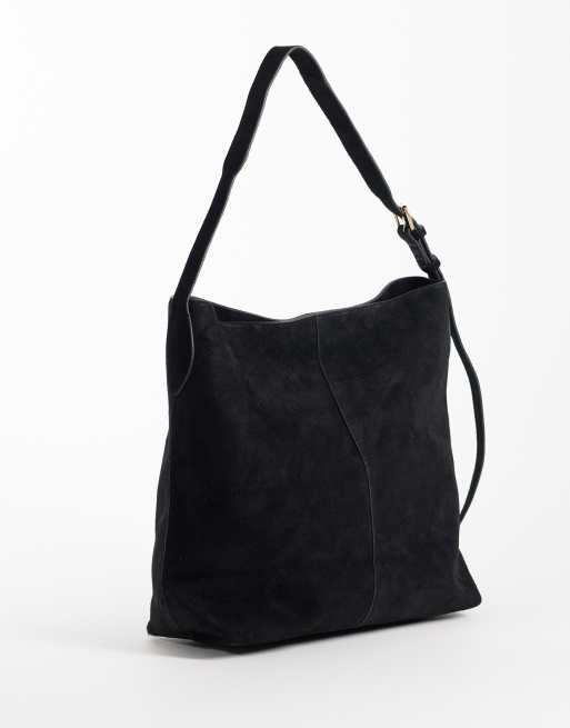 ASOS DESIGN hair on leather bucket bag in black, 4 of 4