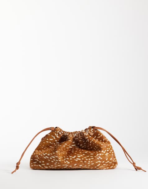 ASOS DESIGN hair on leather drawstring pouch clutch bag with detachable strap in deer print - view 1
