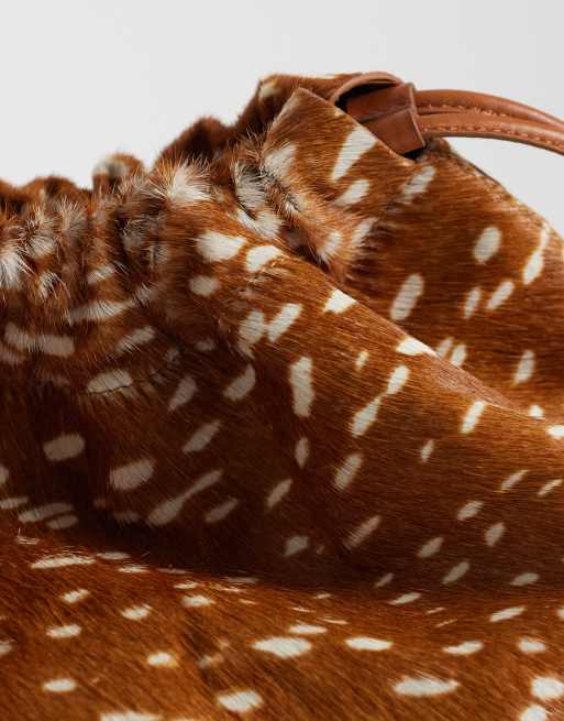 ASOS DESIGN hair on leather drawstring pouch clutch bag with detachable strap in deer print, 3 of 4