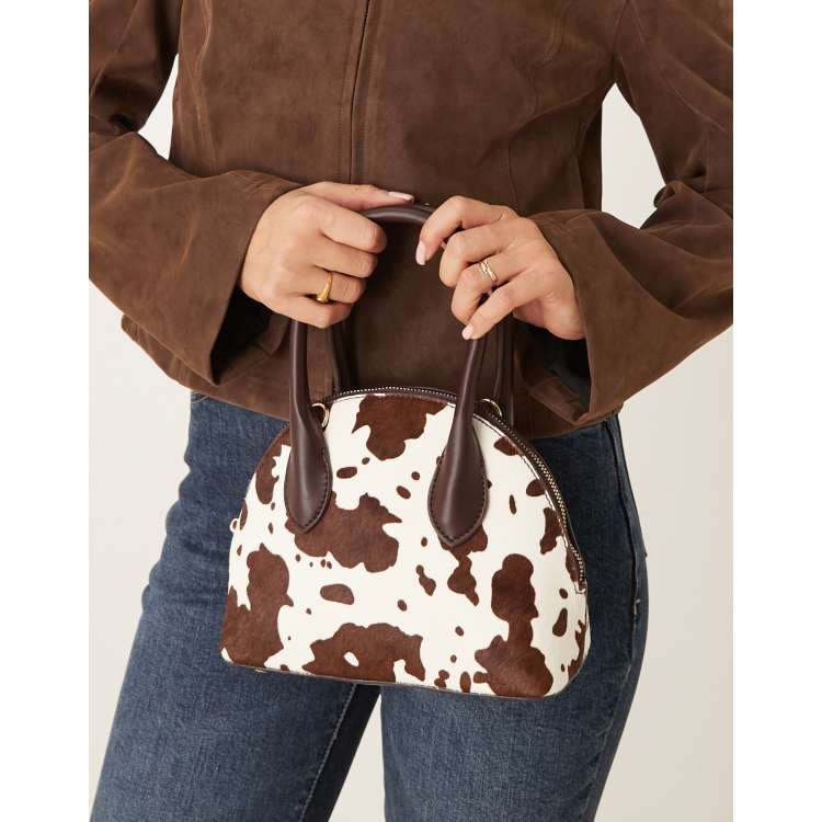 208830339-1-cowprint?$n_750w$&