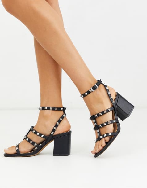 ASOS DESIGN – Haiti – Mit Nieten besetzte Sandalen mit Blockabsatz in Schwarz