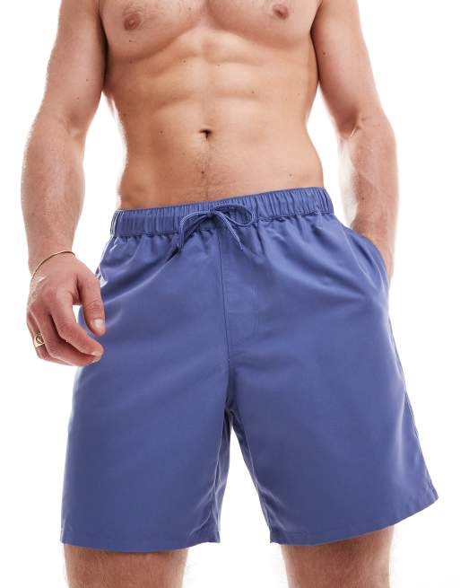 ASOS DESIGN – Halblange Badeshorts in Blau