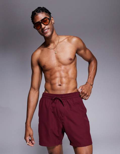 ASOS DESIGN – Halblange Badeshorts in Burgunderrot - view 1