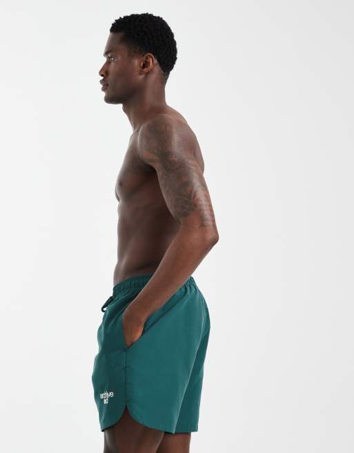 ASOS DESIGN – Halblange Badeshorts in Grün mit Stickerei, 3 von 5