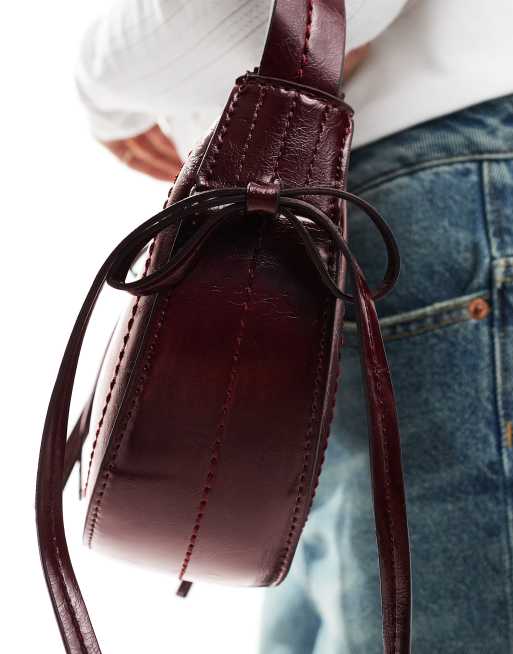 ASOS Design Half Moon Shoulder Bag with Side Bow Detail in burgundy Red