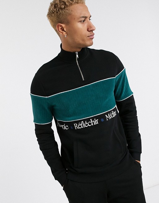 ASOS DESIGN half zip sweatshirt in black with cut & sew