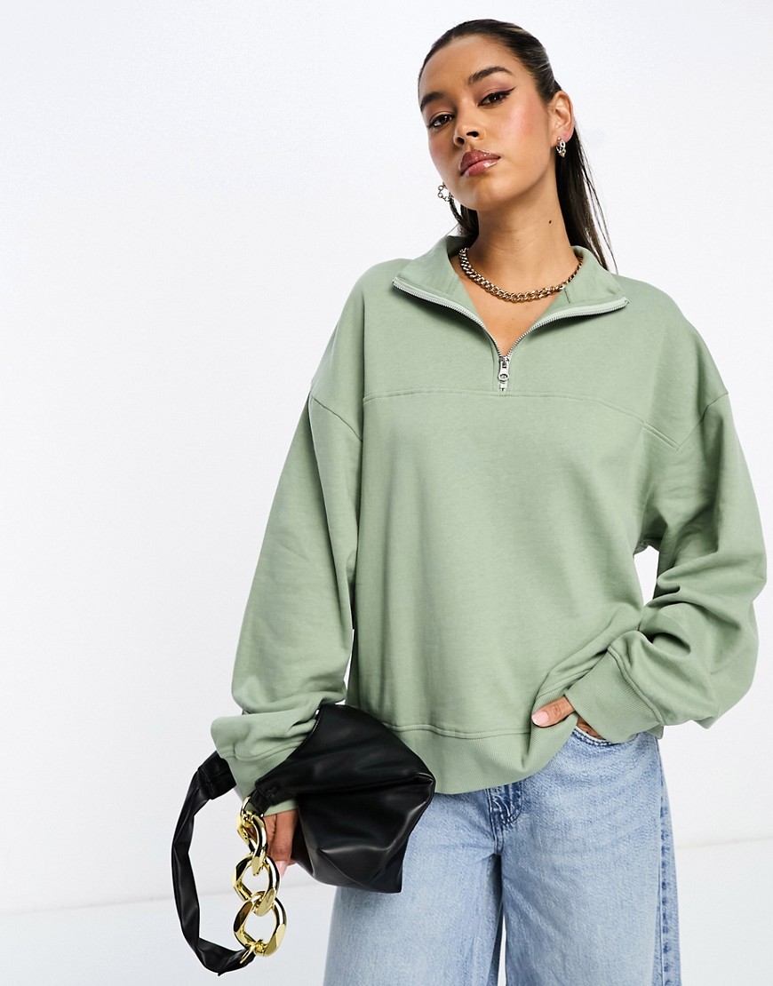 Shop Asos Design Half Zip Sweatshirt In Sage Green