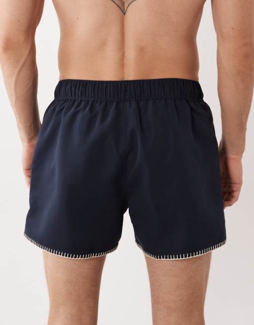 ASOS DESIGN - Halflange zwemshort met borduursel in marineblauw, 6 van 6