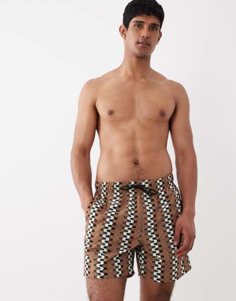 ASOS DESIGN - Halflange zwemshort met geometrische print in bruin - view 1