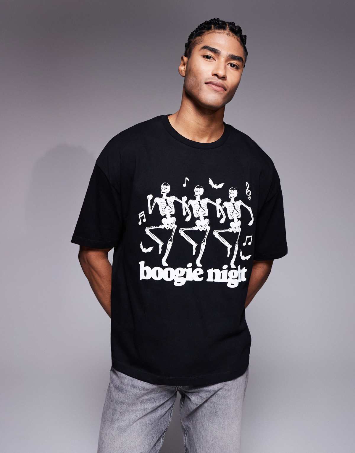 ASOS DESIGN Halloween boxy oversized t-shirt with dancing skeleton graphic in black