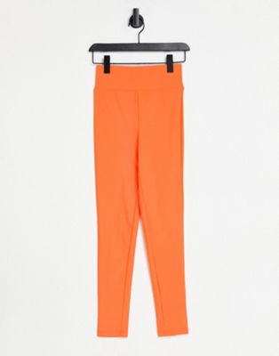  ASOS DESIGN Halloween legging with high waist in matte sheen in orange - ASOS Price Checker