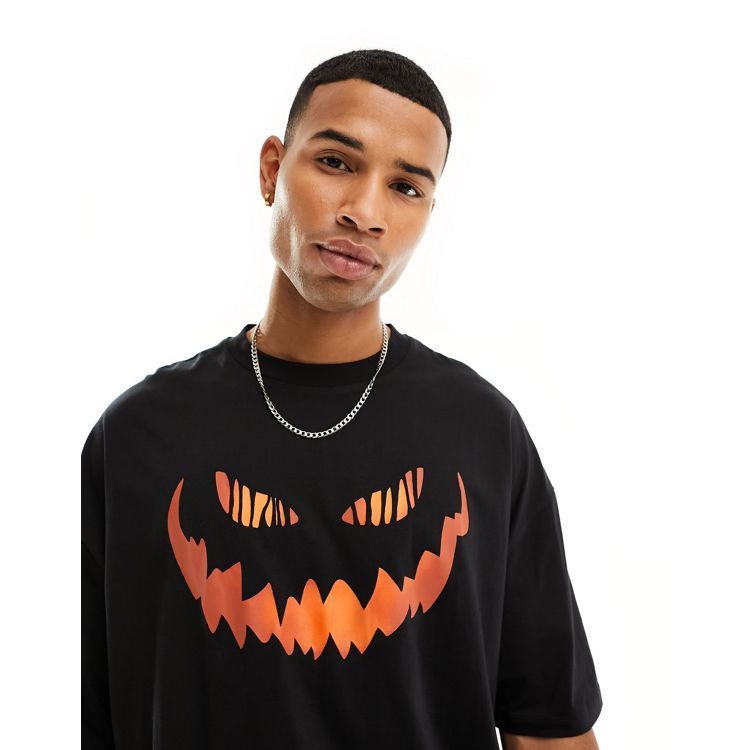 ASOS DESIGN Halloween oversized t-shirt in black with pumpkin face