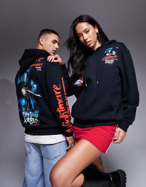 ASOS DESIGN – Halloween – Unisex-Kapuzenpullover in Schwarz mit Oversize-Schnitt und „Nightmare on Elm Street“-Schaumdruck - view 1