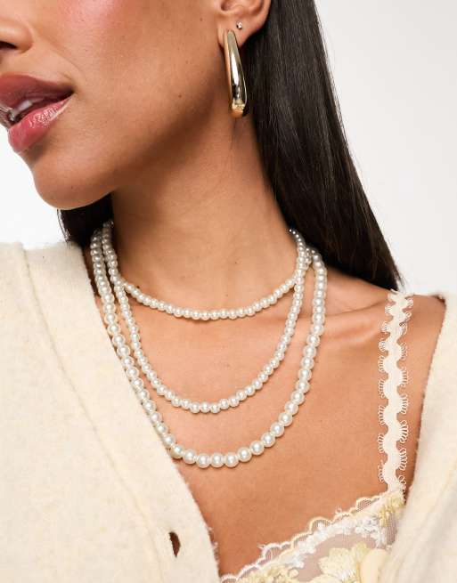 ASOS DESIGN – Halsband i tre rader med fuskpärlor