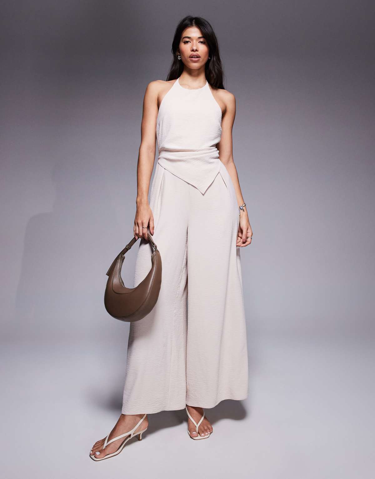 ASOS DESIGN halter asym overlay detail jumpsuit in stone