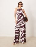 [ASOS DESIGN] ASOS DESIGN halter asymmetric overlay detail jumpsuit in zebra print-Multi 10 Zebra print