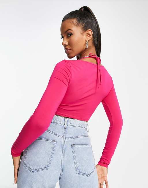 ASOS DESIGN halter long sleeve crop top in pink | ASOS