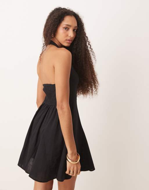 ASOS DESIGN halter mini dress with godet hem in black