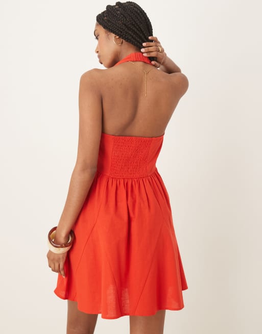 ASOS DESIGN halter mini dress with godet hem in red