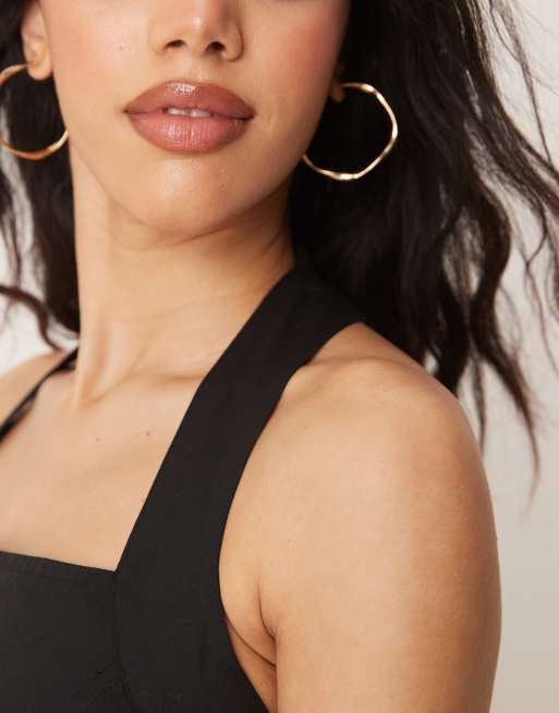 ASOS DESIGN halter mini dress with ruffle hem in black