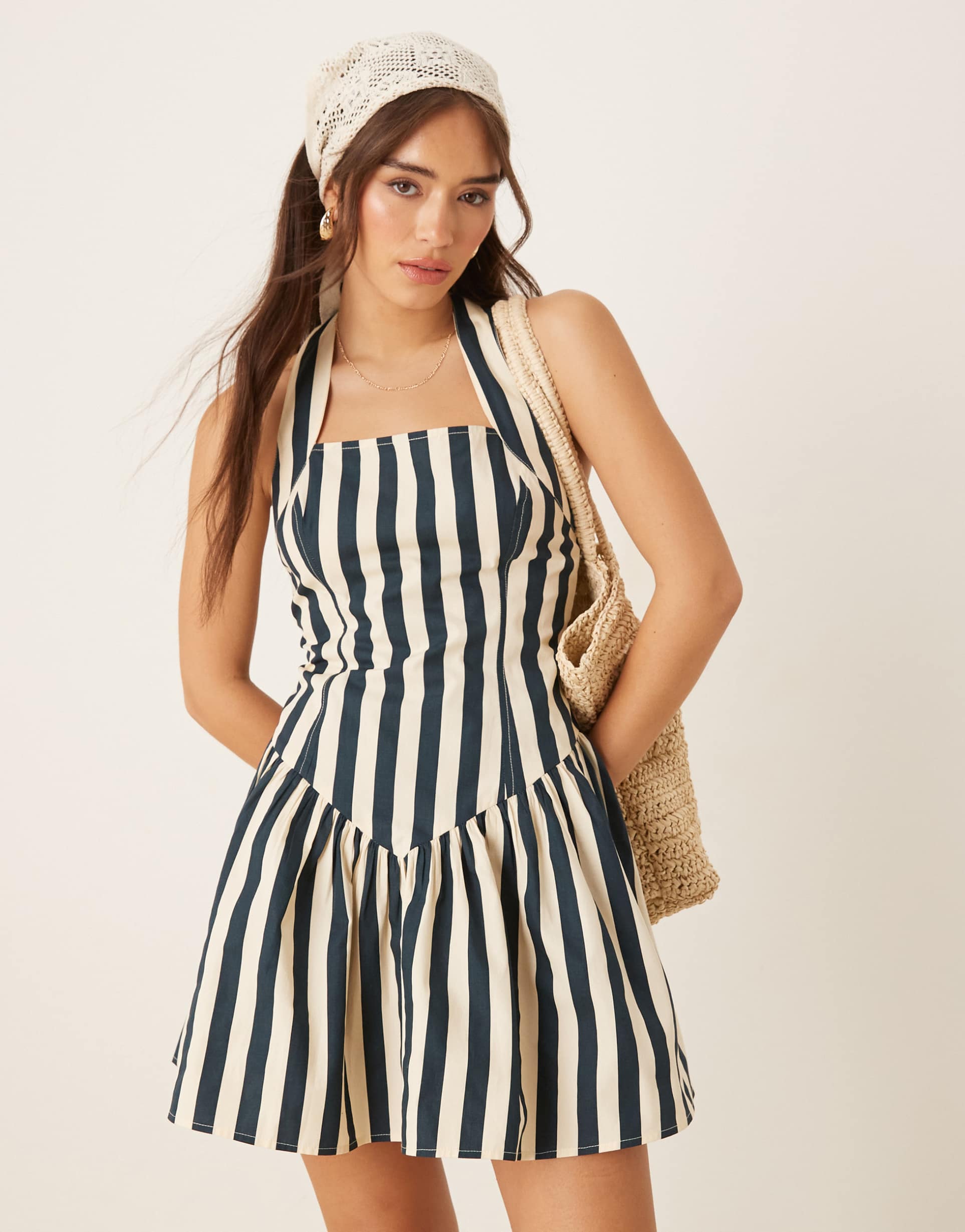 asos design halter mini dress with ruffle hem in stripe