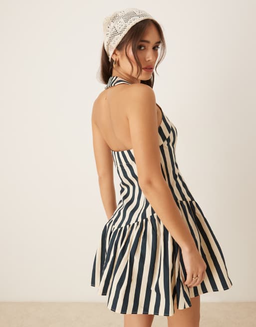 ASOS DESIGN halter mini dress with ruffle hem in stripe